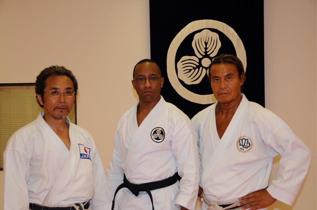 The author, Dr. Michael Hunter, is in a karate uniform (including a black belt). His sensei is to his left and another karate master (from Japan) to Michael’s right. While intense activity such as karate has great benefits, folding in Zone 2 cardio activity can improve endurance and overall fitness.