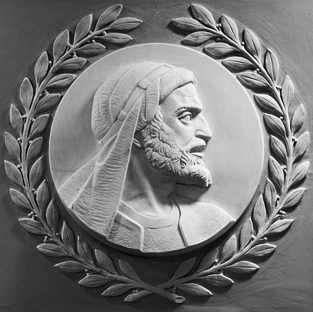 Bas relief of Maimonides in the United States House of Representatives. Black and white image. Maimonides is seen from collarbone level up and dons a head covering as he looks to the right. He has a long beard.
