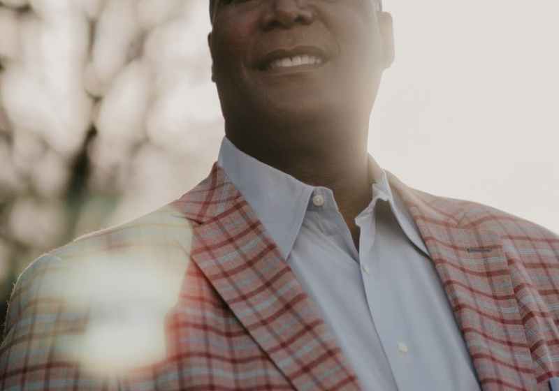 man in red and white plaid button up shirt
