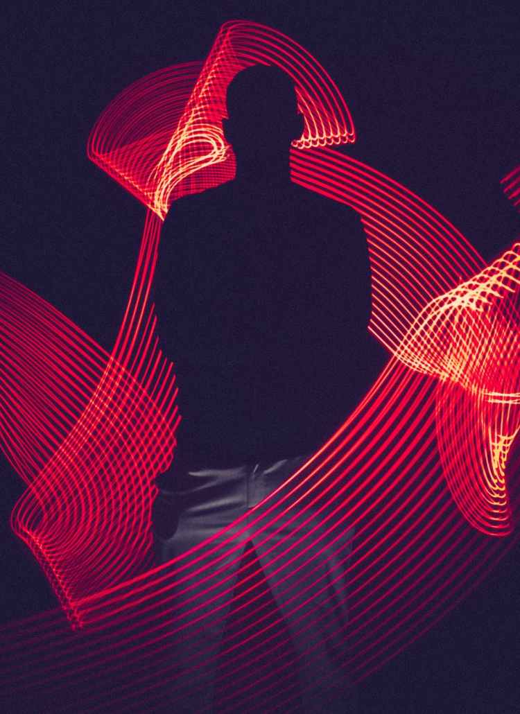red led light with silhouette of a man