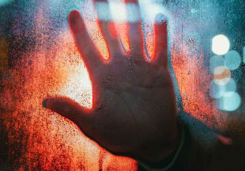 hand touching glass