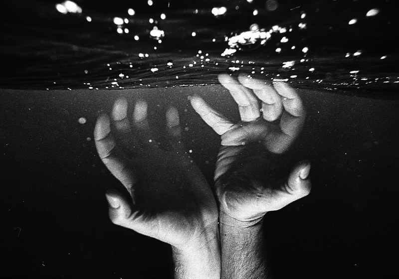 persons feet on water