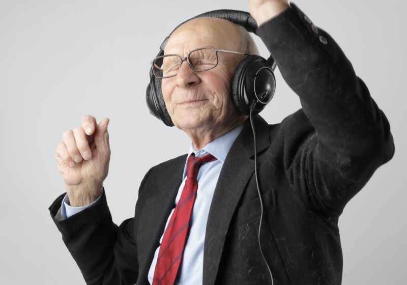 man in black jacket wearing black headphones