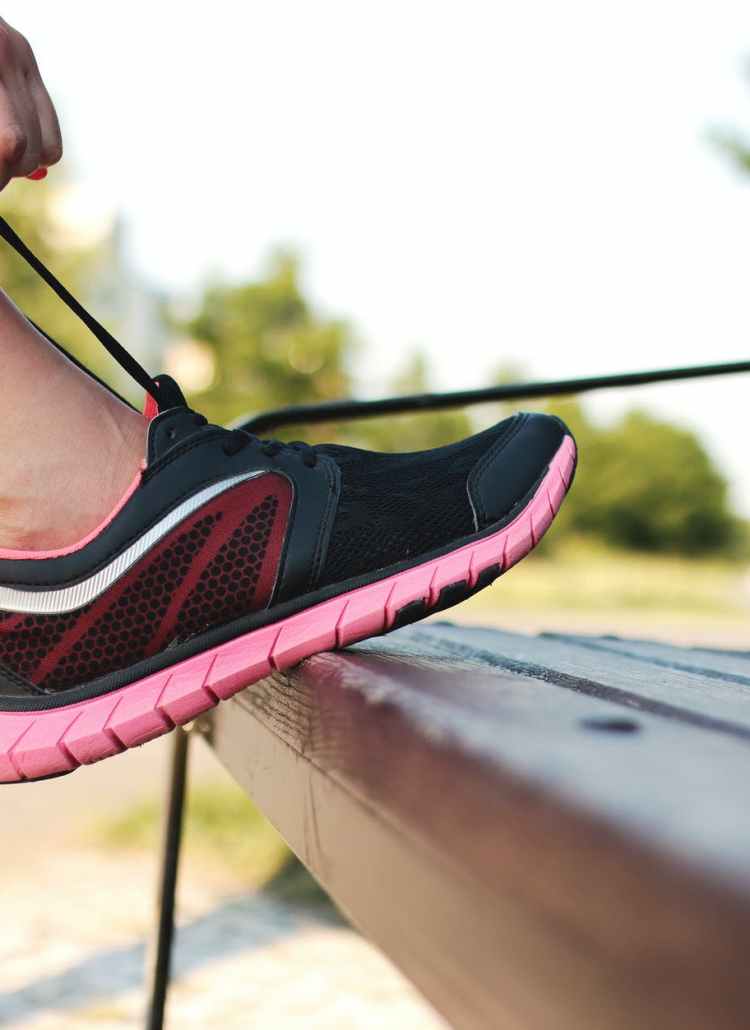 person foot on bench
