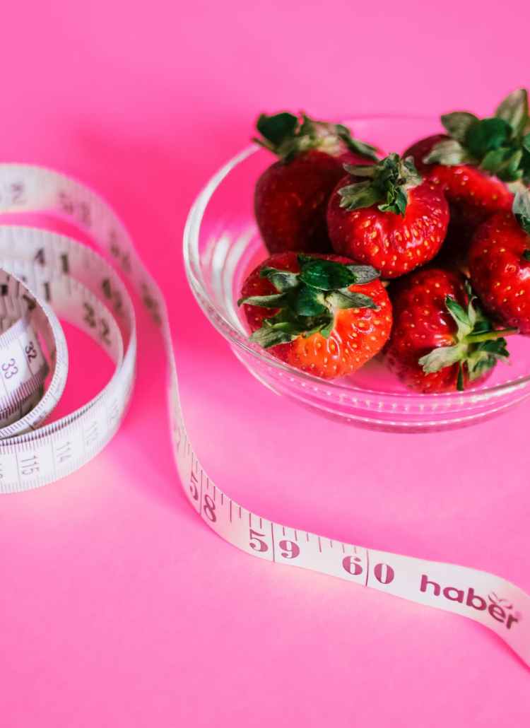 strawberries and measuring tape
