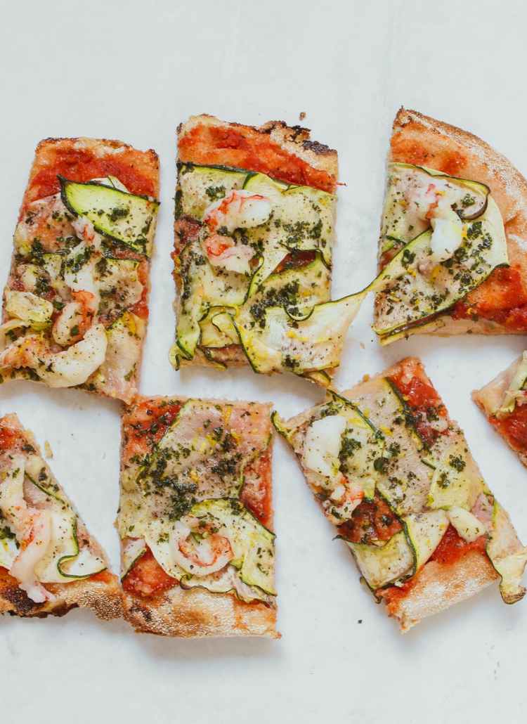 a top view of a sliced pizza