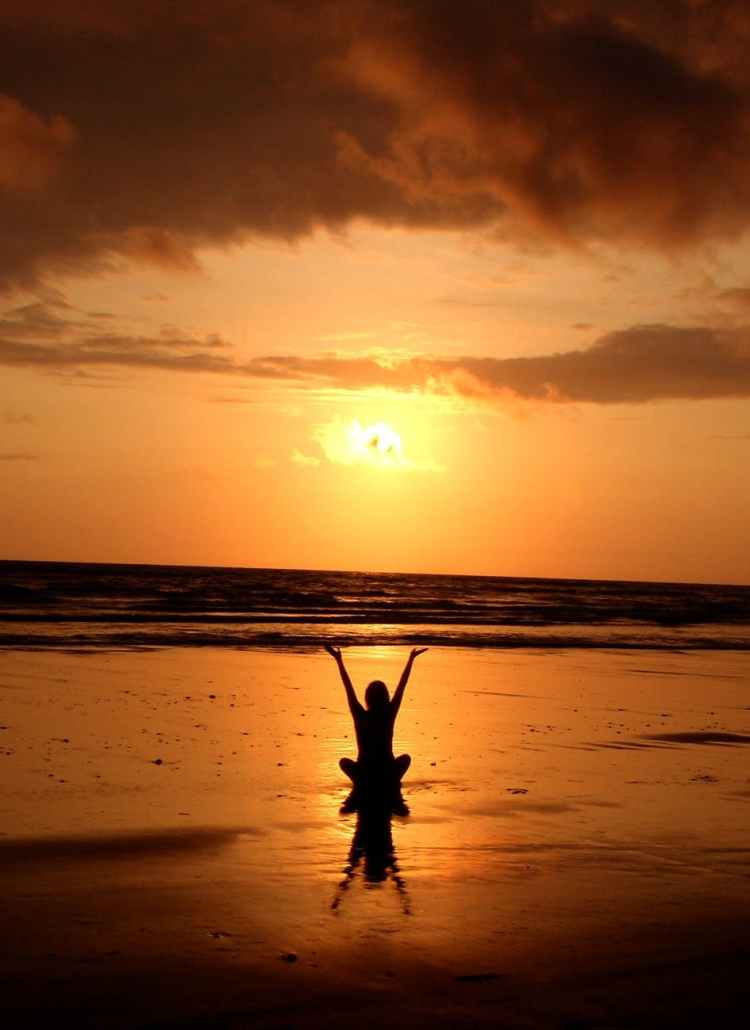 silhouette of person raising its hand