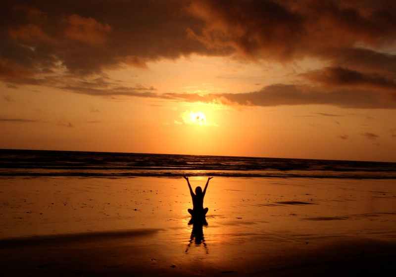 silhouette of person raising its hand