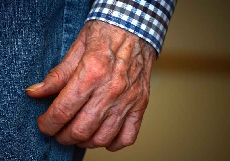 person in blue denim jeans