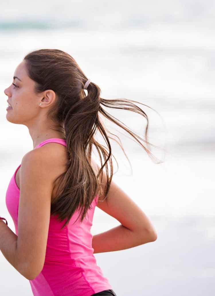 selective focus photography of woman in pink shirt
