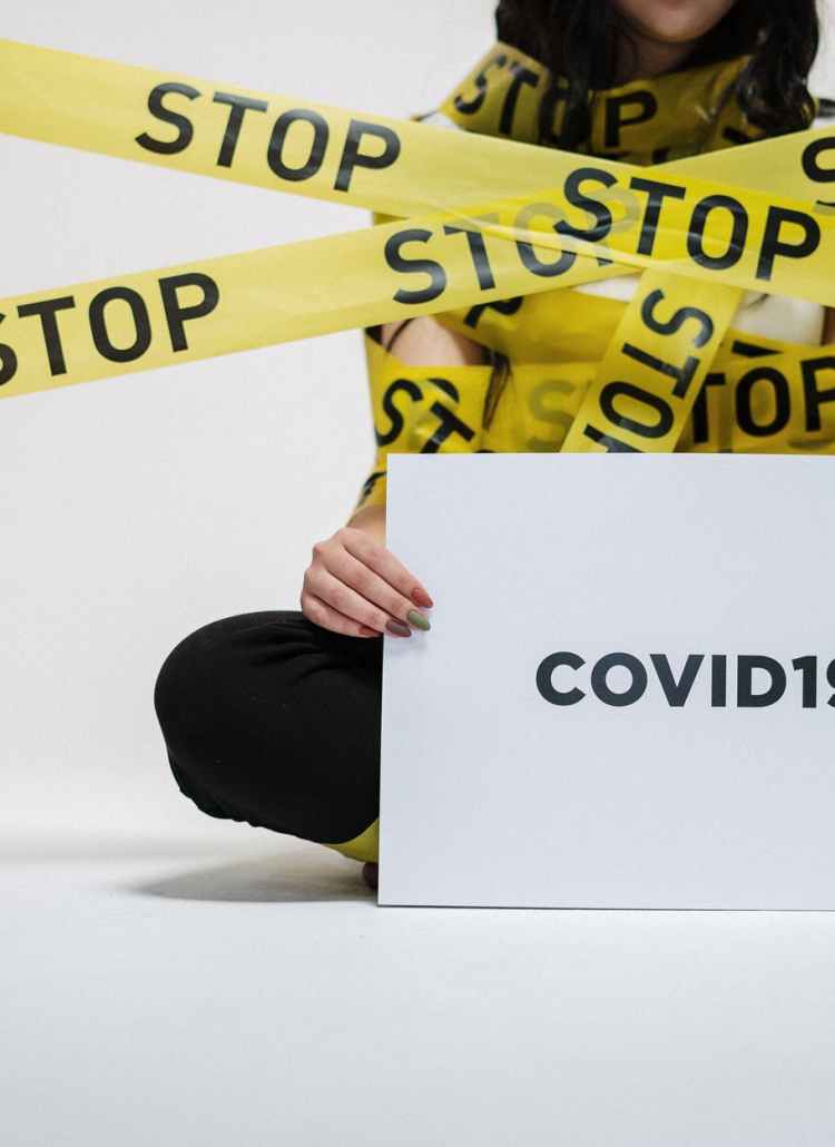woman holding sign