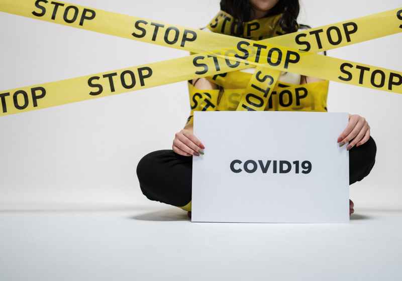 woman holding sign