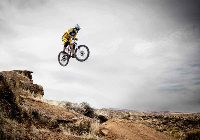 person riding bike making trek on thin air
