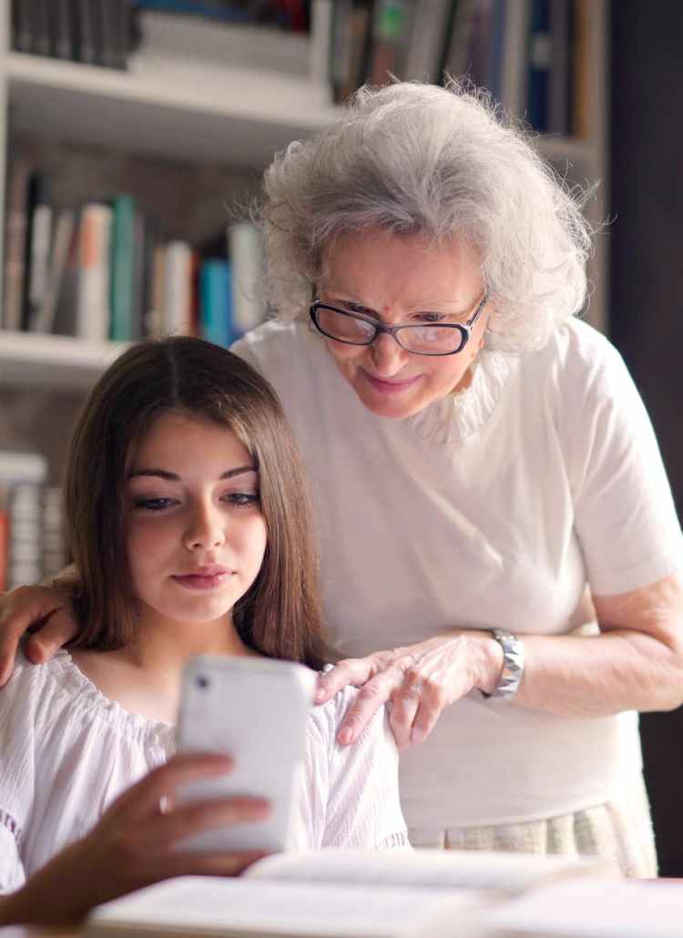 women looking at cellphone