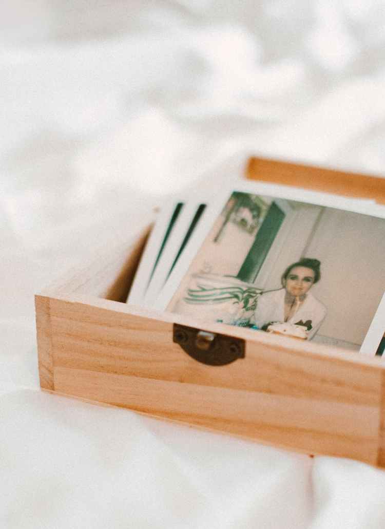 close up of pictures on wooden box