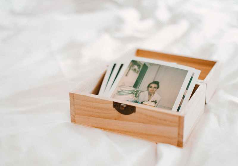 close up of pictures on wooden box