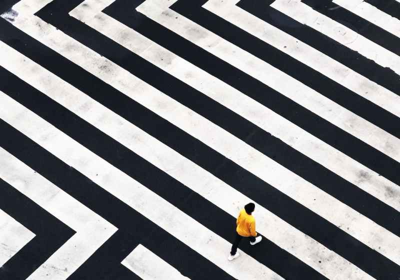 man wearing yellow jacket