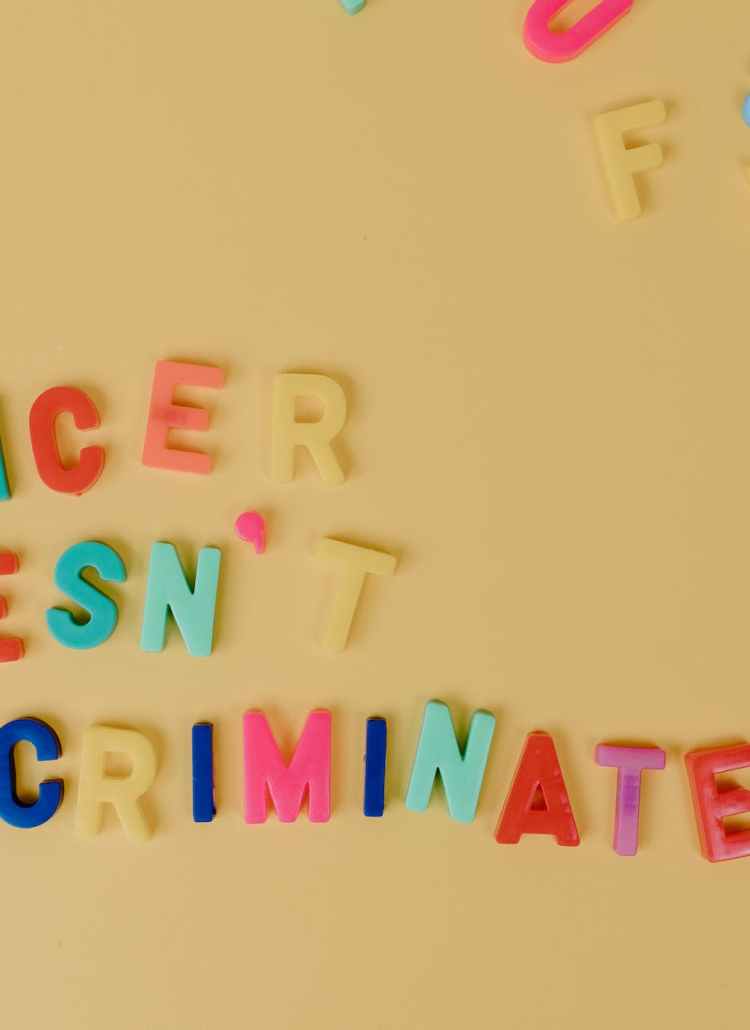 colorful letters on a beige colored surface