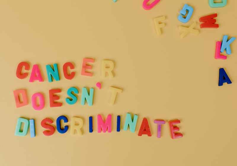 colorful letters on a beige colored surface