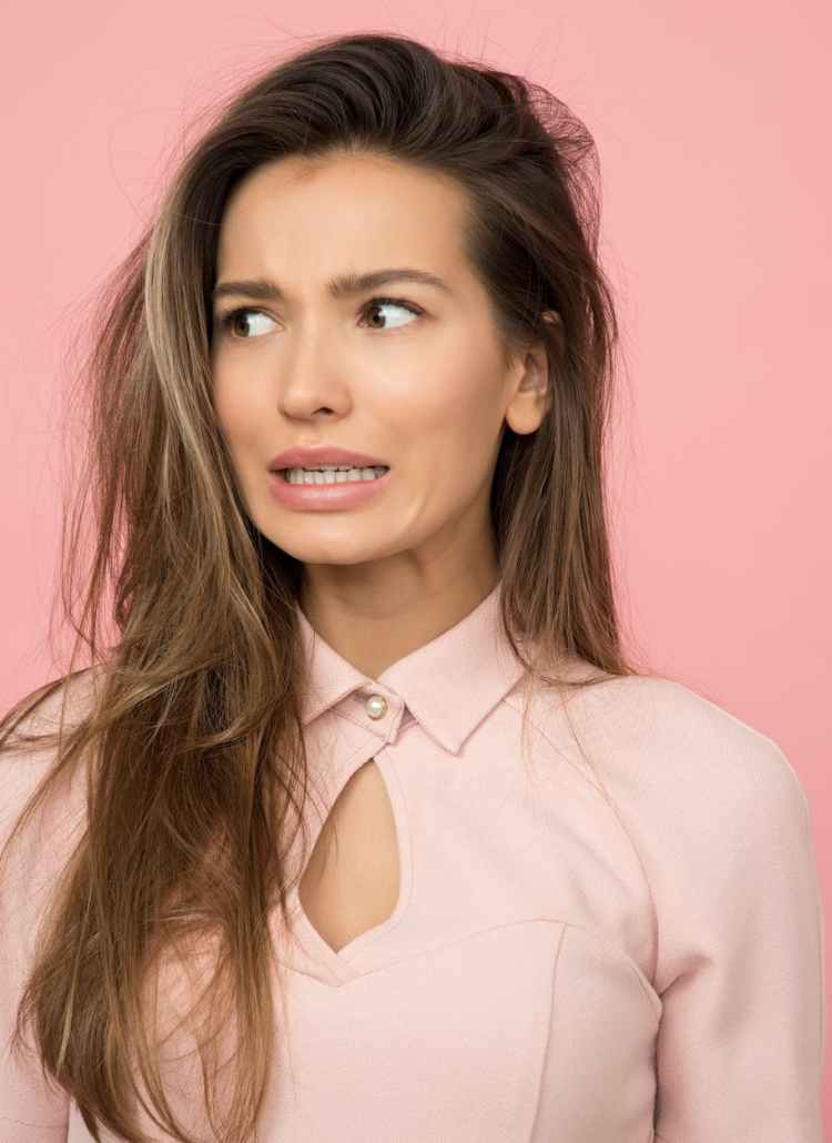 woman wearing pink top