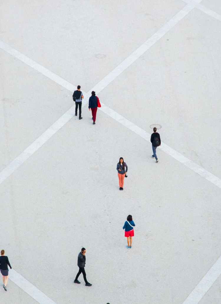 people walking on spacious concrete square
