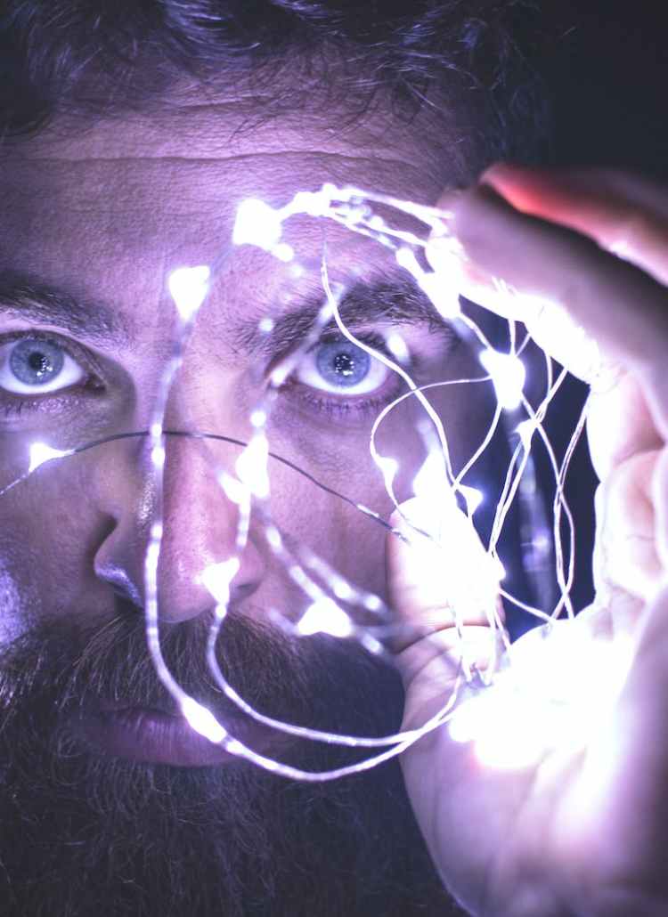 person holding string lights photo