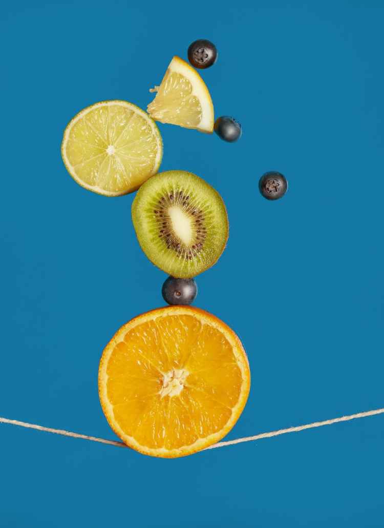 fruit slices balancing on a line