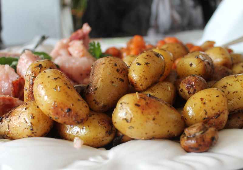 roasted potatoes in close up photography