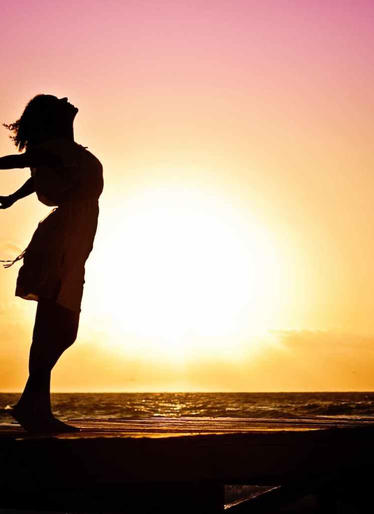 lady in beach silhouette during daytime photography