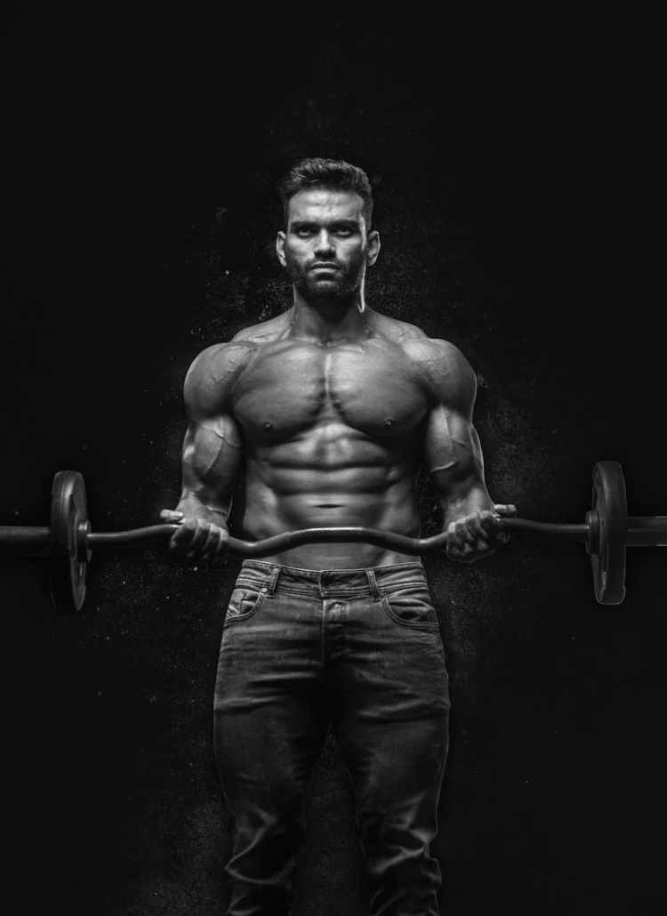 man holding barbell