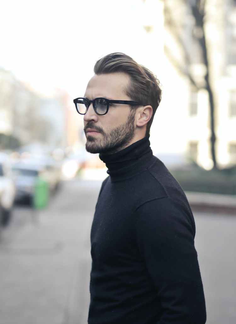 man standing on street