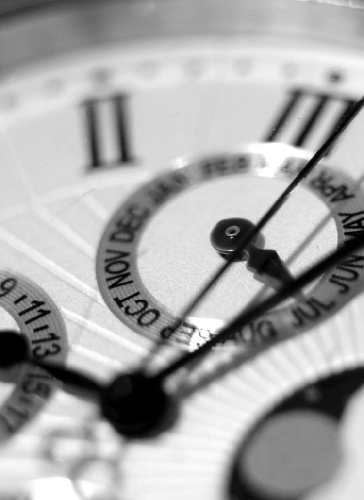 round silver colored chronograph watch